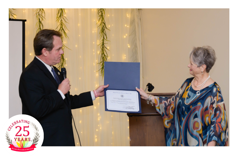 Stephanie Weber, Founder of Suicide Prevention Services of America, with Geneva Mayor Kevin Burns